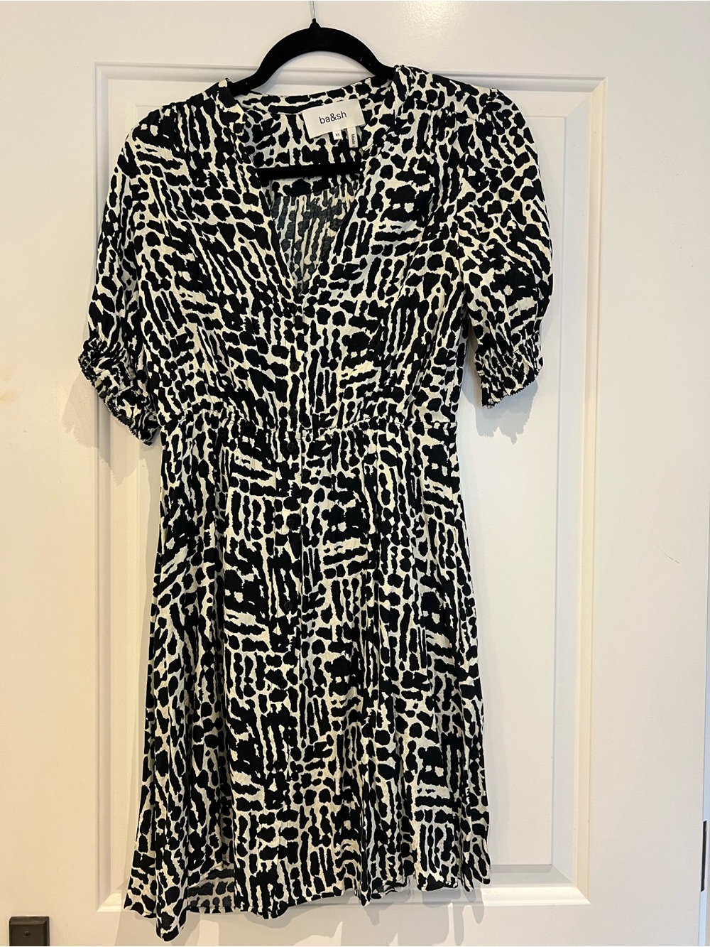 ba&sh Black and White Patterned V‑Neck Mini Dress